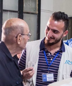 JRS Syria team member accompanies a beneficiary