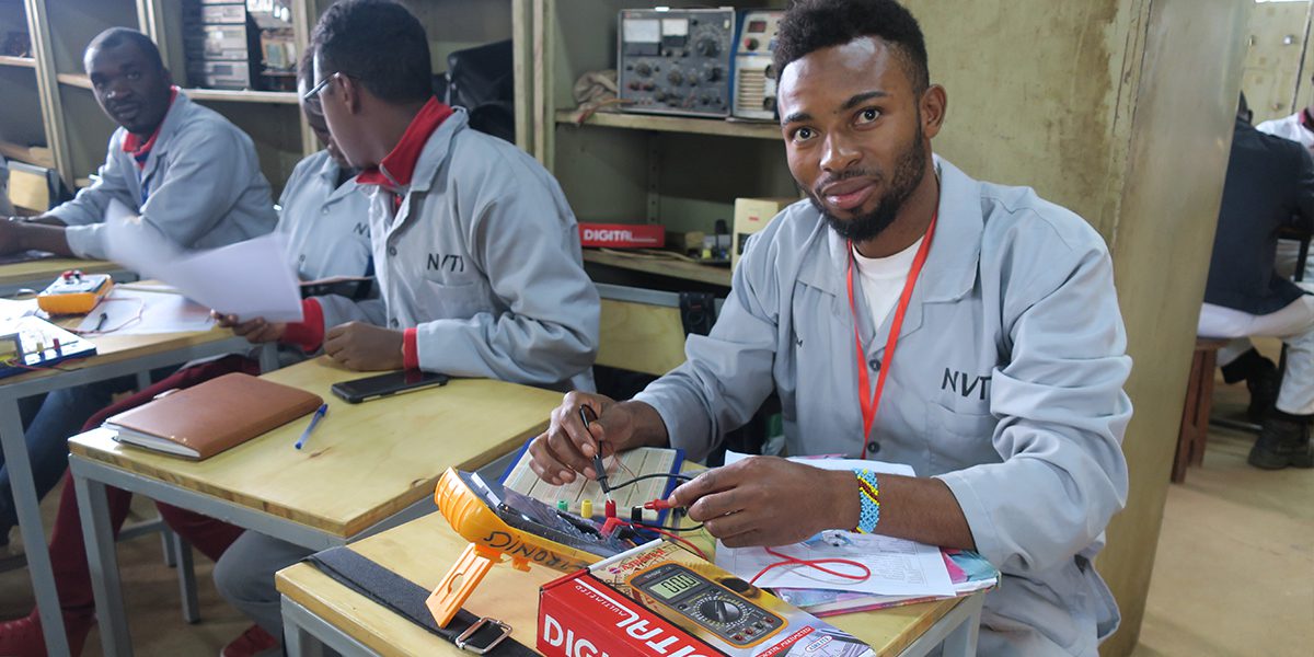 The electronics class is part of vocational programs in Kampala created in partnership with the techical institute . Students learn how to do electrical work on phones, television, and radio repair.