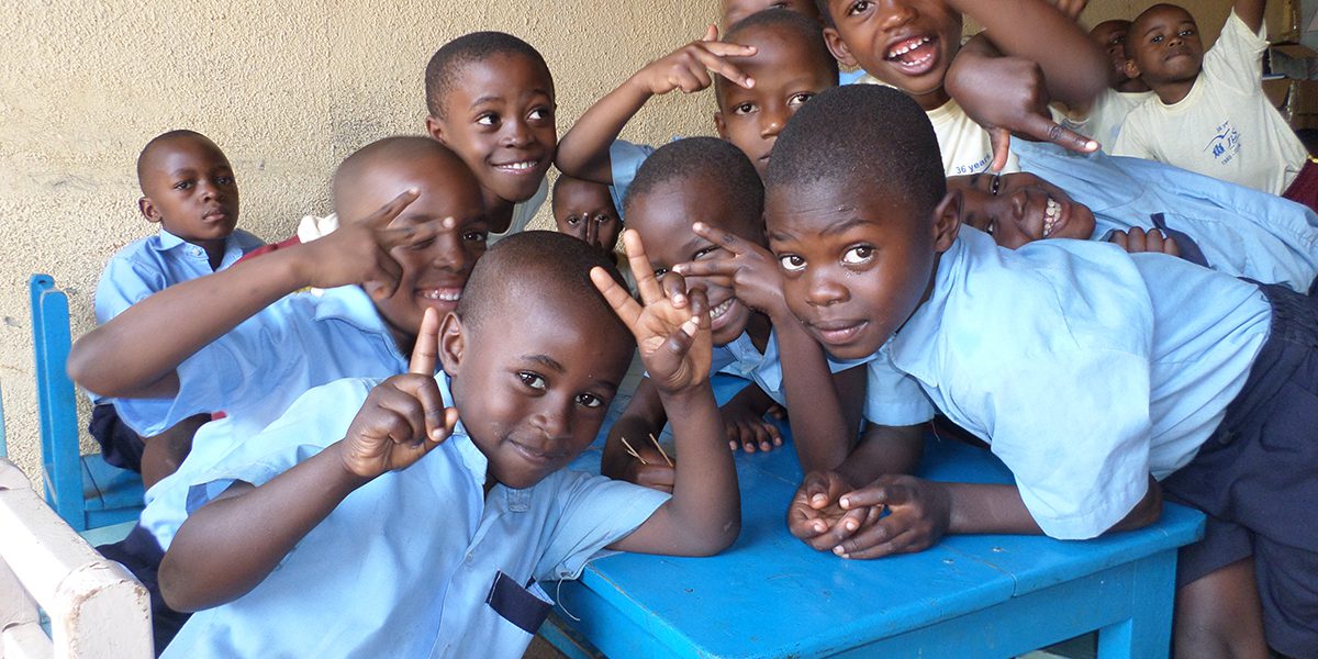 Young refugees in the Jesuit Refugee Service Kampala Urban Emergency Program's kindergarten in the JRS compound.
