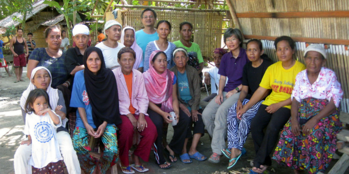 Displaced persons attend a meeting hosted by Jesuit Refugee Service staff in Maguindanao, Philippines.