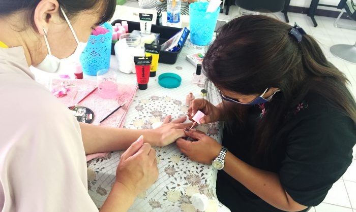 Professional training class for students who are interested in beauty salon. Urban Education Project. Bangkok, Thailand.